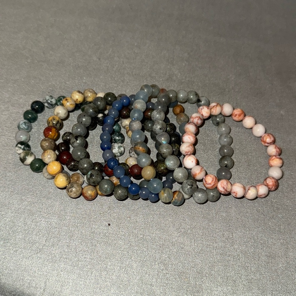 #22 set of assortment of beaded bracelets